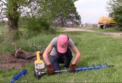 Becky uses a Dewalt DWD450 to drill horizontally with auger